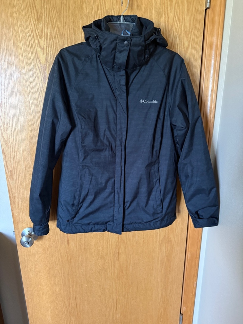 Columbia Black interchange 3 in one Waterproof Hooded Jacket.